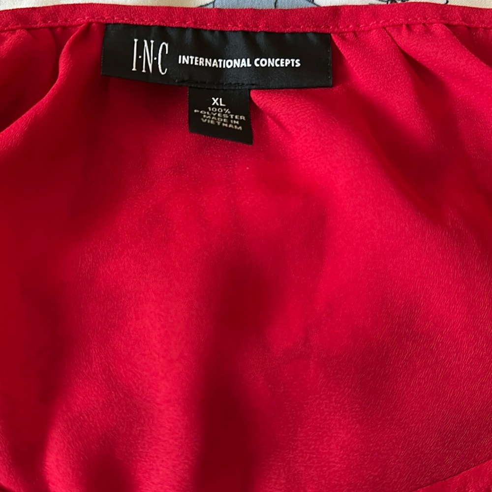 Red light blouse with gold accents